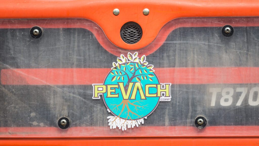 A close up of the Pevach Corp logo.