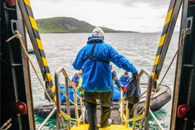 View zodiac from gangway man boarding