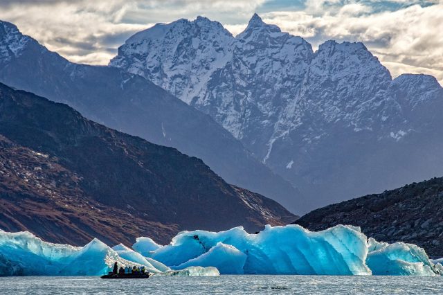 Zodiac cruise with glacier mountains Greenland