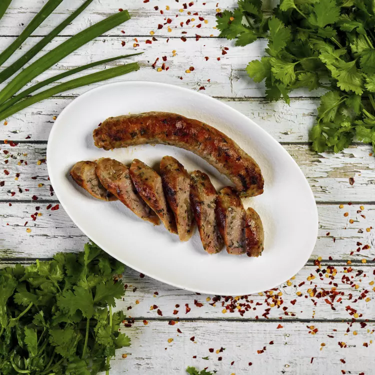 Salade de 2 saucisses moutarde et herbes, orzo, noisettes caramélisées (1 litre)