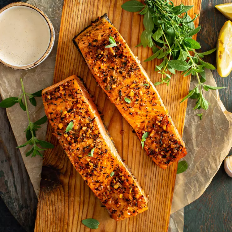 2 filets de truite arc-en-ciel au citron, ail et paprika, sauce vierge aux pistaches