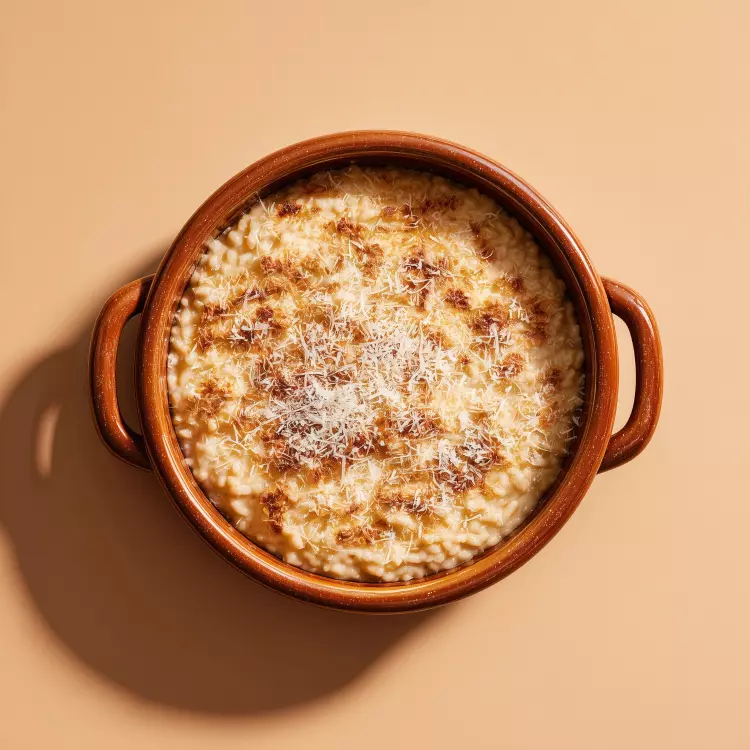 Étagé de canard confit et risotto au Parmigiano