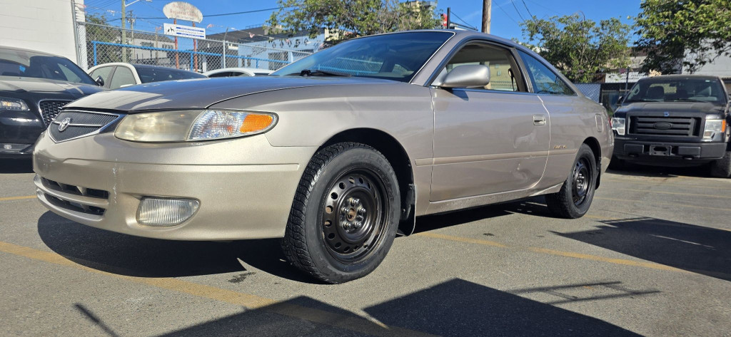 Gold 1999 Toyota Camry Solara Coupe Front-Wheel Drive Automatic