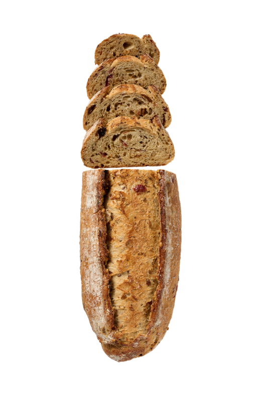 Pain figue, fruit rouge et grains partiellement tranchée