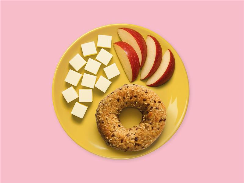 Back-to-school 2025 campaign visual – breakfast plate with fruit, cheese, and bread