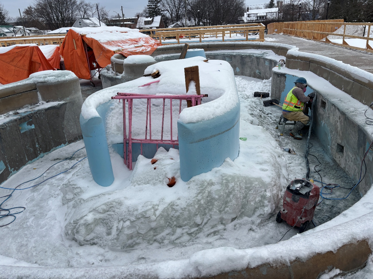 Surface finish removal from pool basins ongoing. Image of lazy river location.
