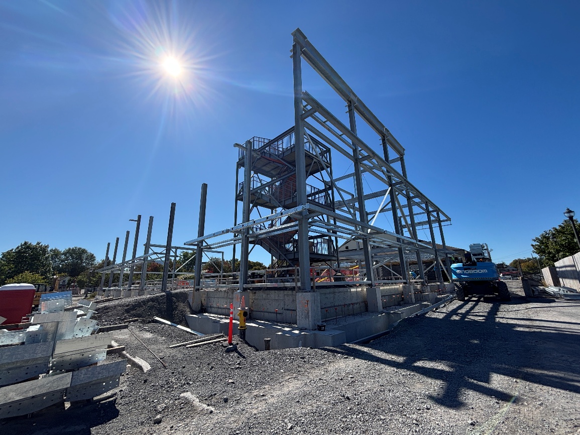 General view of site looking Southwest showing progress of structural steel installation.