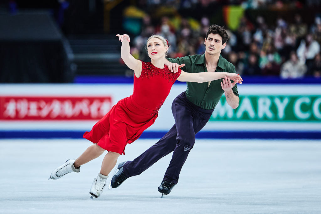 Paul Poirier and Piper Gilles skating.