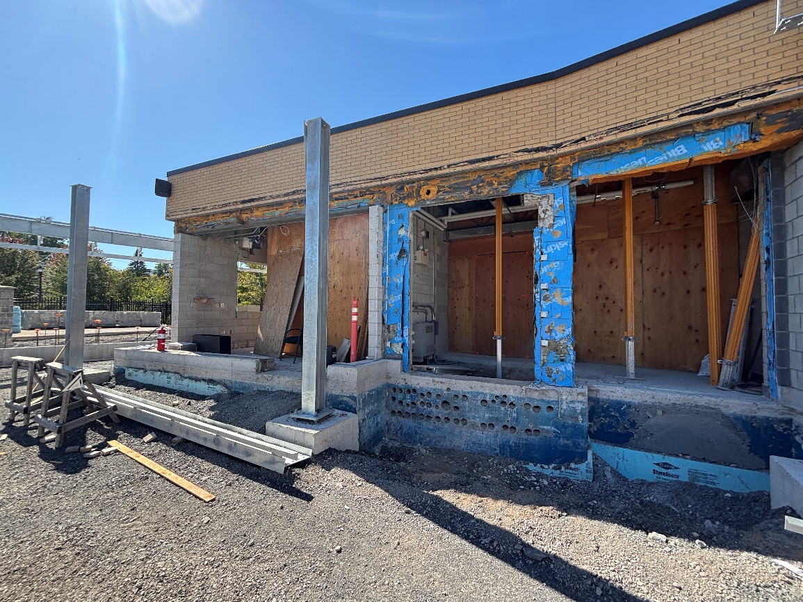 View of existing west wall showing completed masonry removals and foundation wall removal at mechanical room.