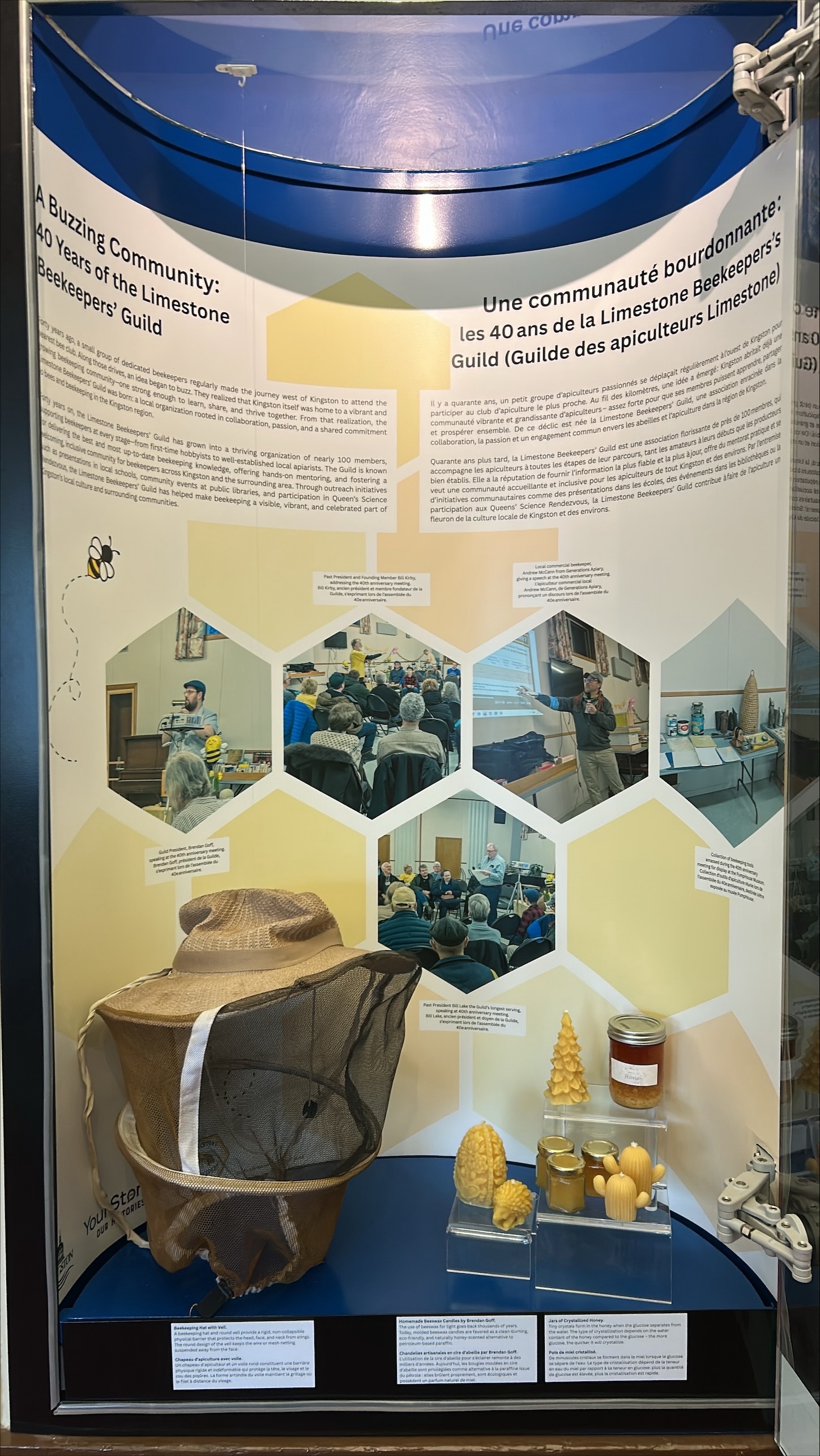 A small exhibit containing written stories, photos and small items representing the Limestone Beekeepers' Guild.