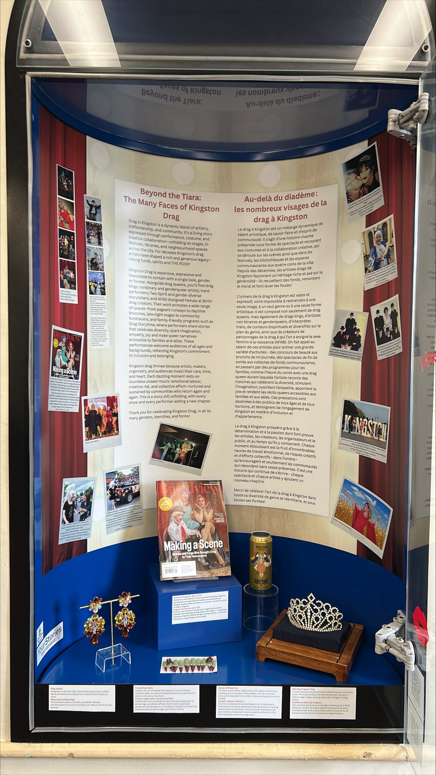 A small exhibit containing written stories, photos and small items representing the history of Kingston's Drag community.