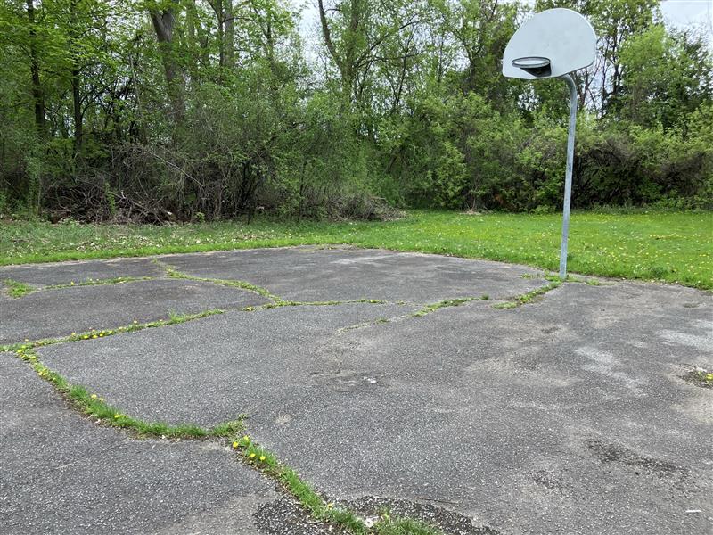 A view of the old basketball court looking northwest to the north basket.