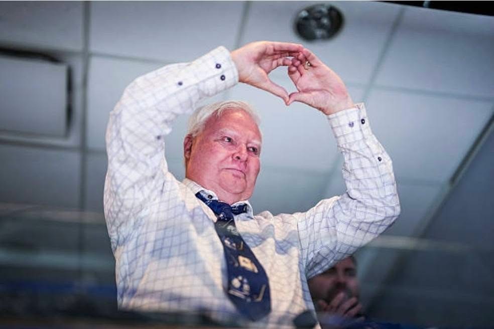 Joe Bowen making an O shape with hands.