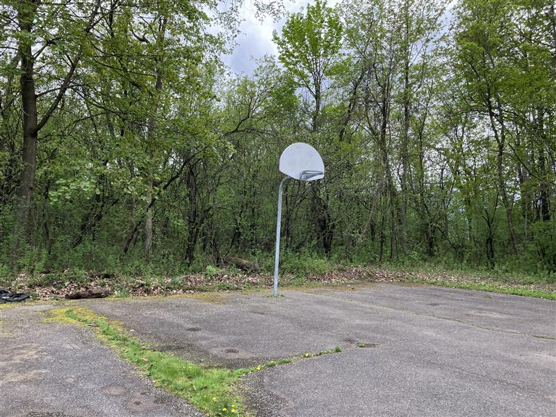 A view of the old basketball court looking southwest to the south basket.