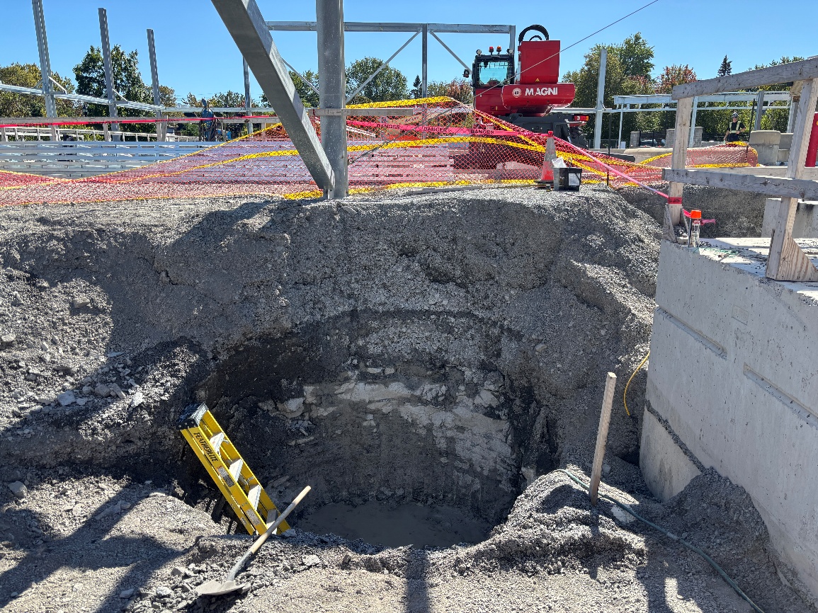View looking North showing completed rock excavation in preparation of manhole placement.