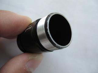 Cleaning external threads of flashlight body tube