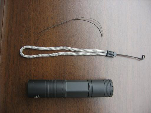 Lanyard, filament, and Fenix flashlight