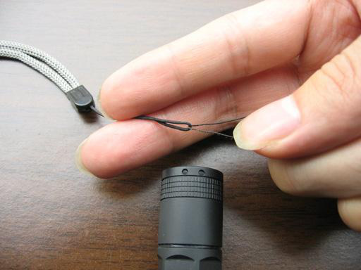 Hooking filament through lanyard loop