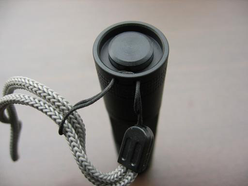 Lanyard securely attached to tailcap