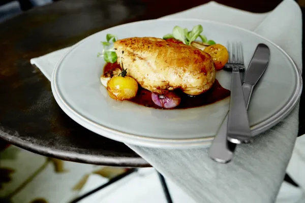 ROAST CHICKEN SUPREME WITH CHERRY TOMATOES AND PEARL ONIONS