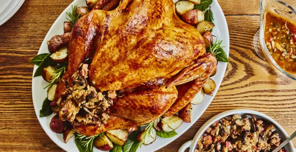 WHOLE ROAST TURKEY WITH WILD MUSHROOM STUFFING AND MUSHROOM SAUCE