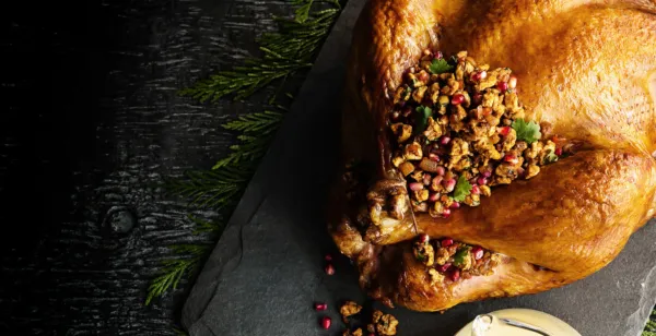 CHICKEN AND POMEGRANATE-STUFFED TURKEY, POTATO AND FETA PURÉE, DIJON SAUCE