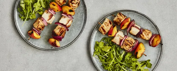 GRILLED CHICKEN, HALLOUMI, AND PEACH SKEWERS