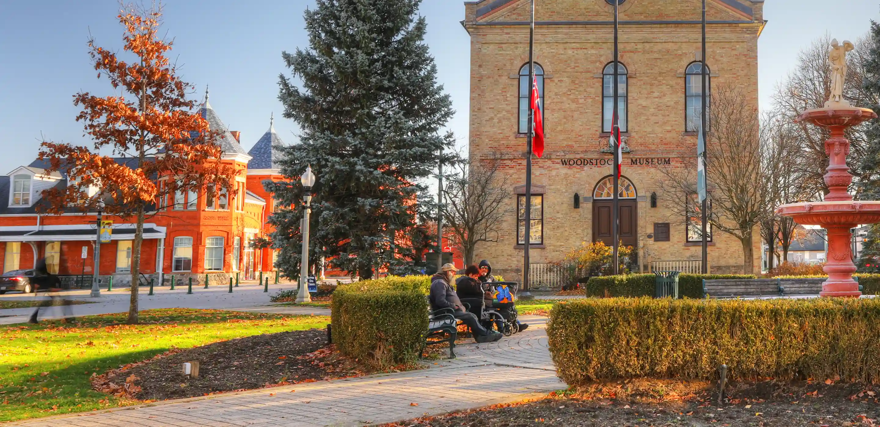 Woodstock museum with people on a bench