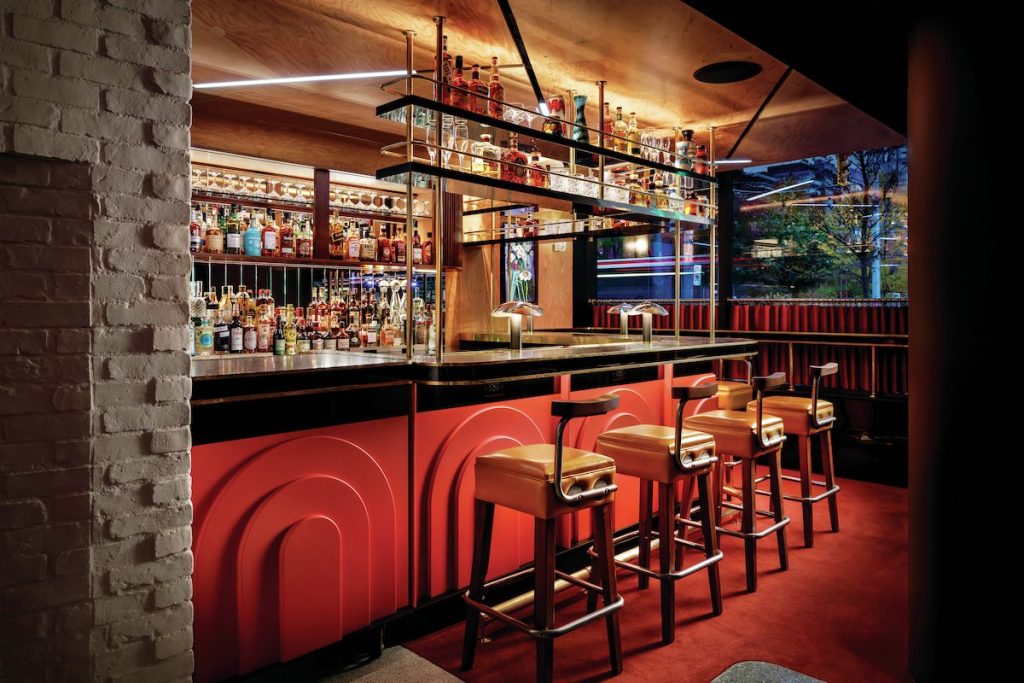 Hotel bar with red accents. 