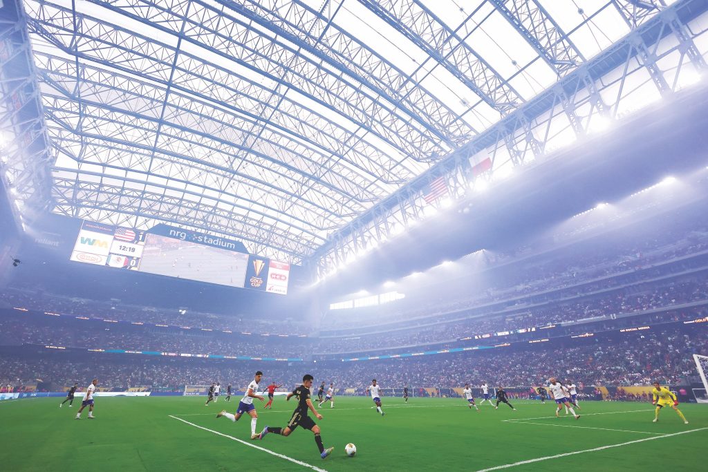 Soccer stadium filled with fans. 