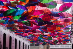 Colourful umbrellas hanging above a street in Caracas, Venezuela