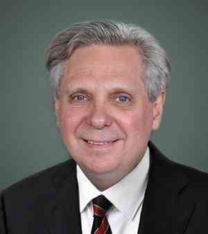 Dr. Mark Kristmanson