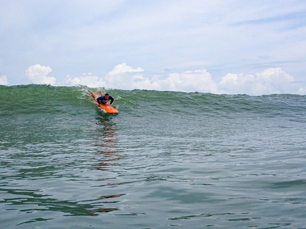 Popping up on a longboard