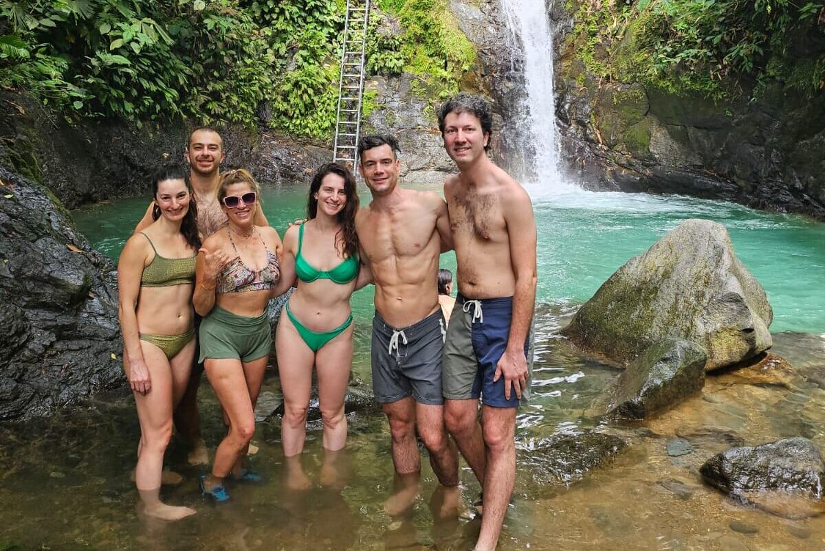 Guests enjoying the Uvita Waterfall in Uvita, Osa, Costa Rica