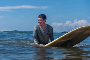 Surfing in the Marino Ballena National Park in Uvita, Osa, Costa Rica
