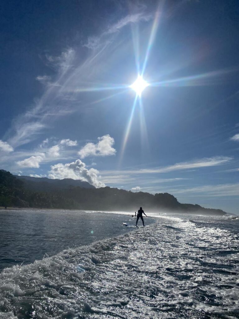 Surfing in the Marino Ballena National Park in Uvita, Osa, Costa Rica