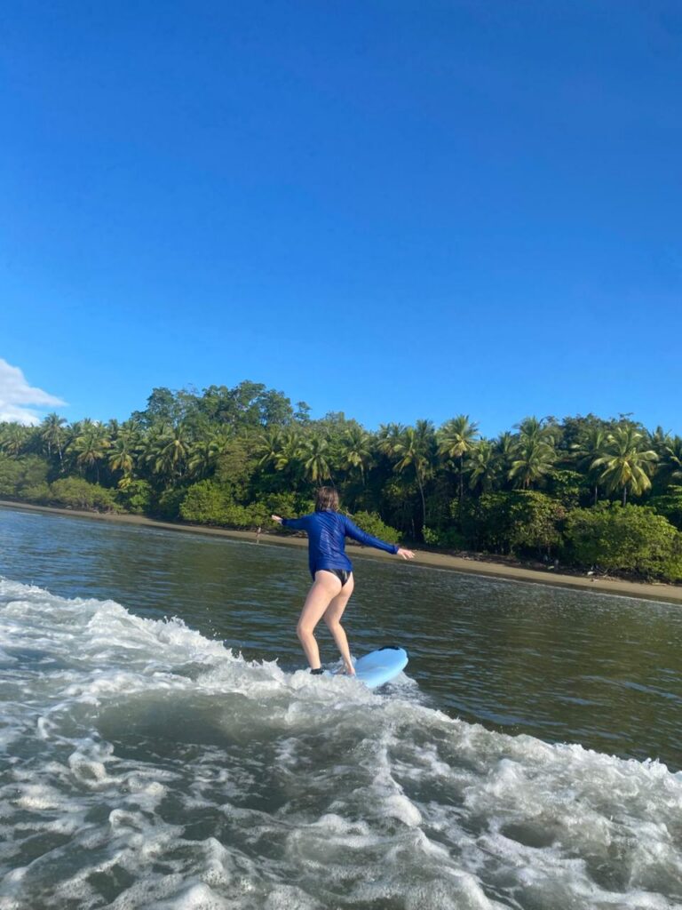 Surfing in the Marino Ballena National Park in Uvita, Osa, Costa Rica