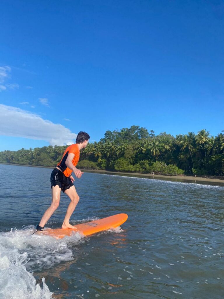 Surfing in the Marino Ballena National Park in Uvita, Osa, Costa Rica