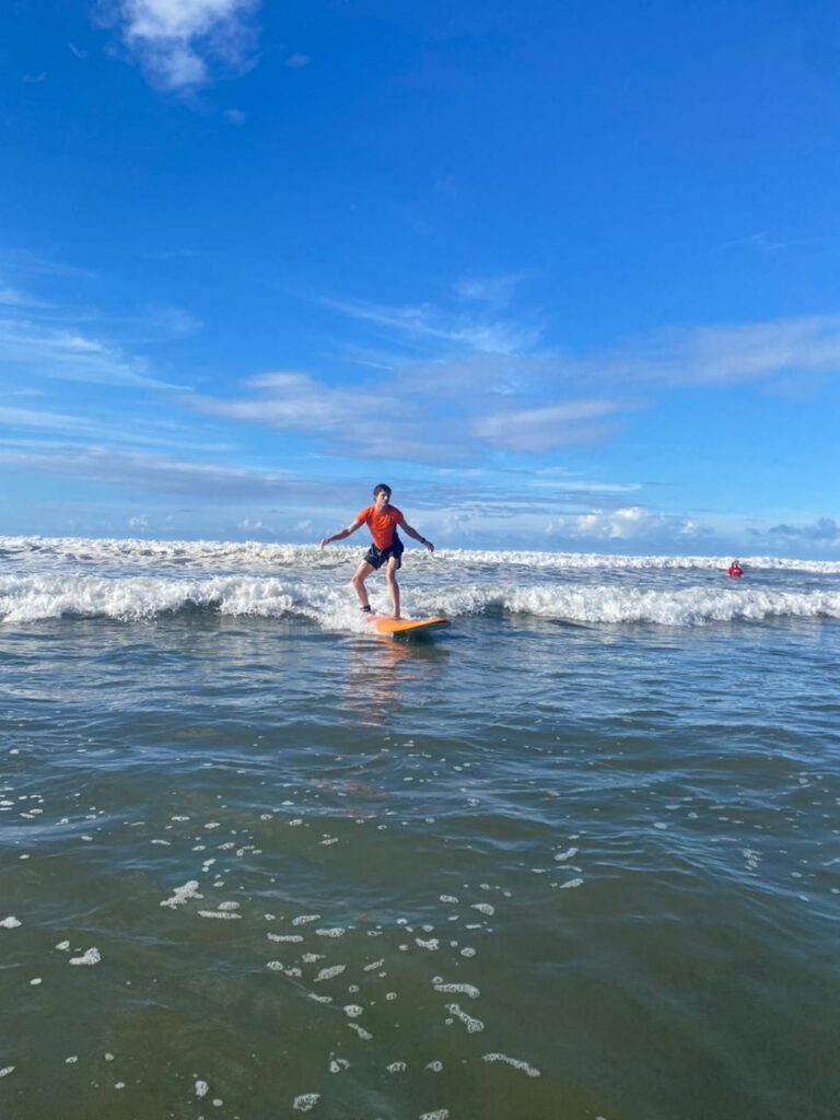 Surfing in the Marino Ballena National Park in Uvita, Osa, Costa Rica