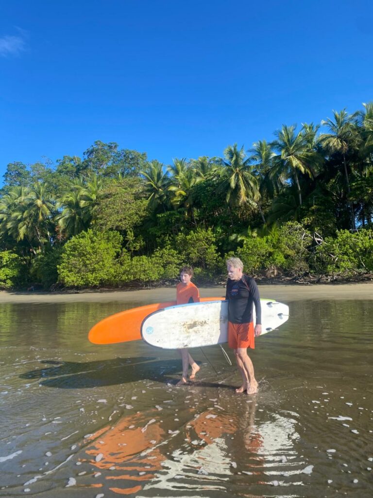 Surfing in the Marino Ballena National Park in Uvita, Osa, Costa Rica