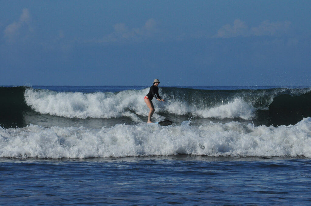 Surfing in the Marino Ballena National Park in Uvita, Osa, Costa Rica
