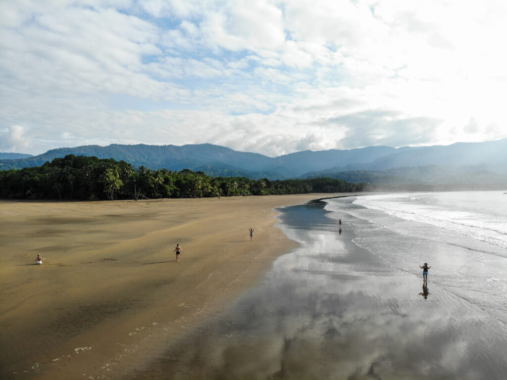 A peaceful walk on the beach in Uvita, Costa Rica, showcasing the relaxing and safe environment for travelers in 2026.