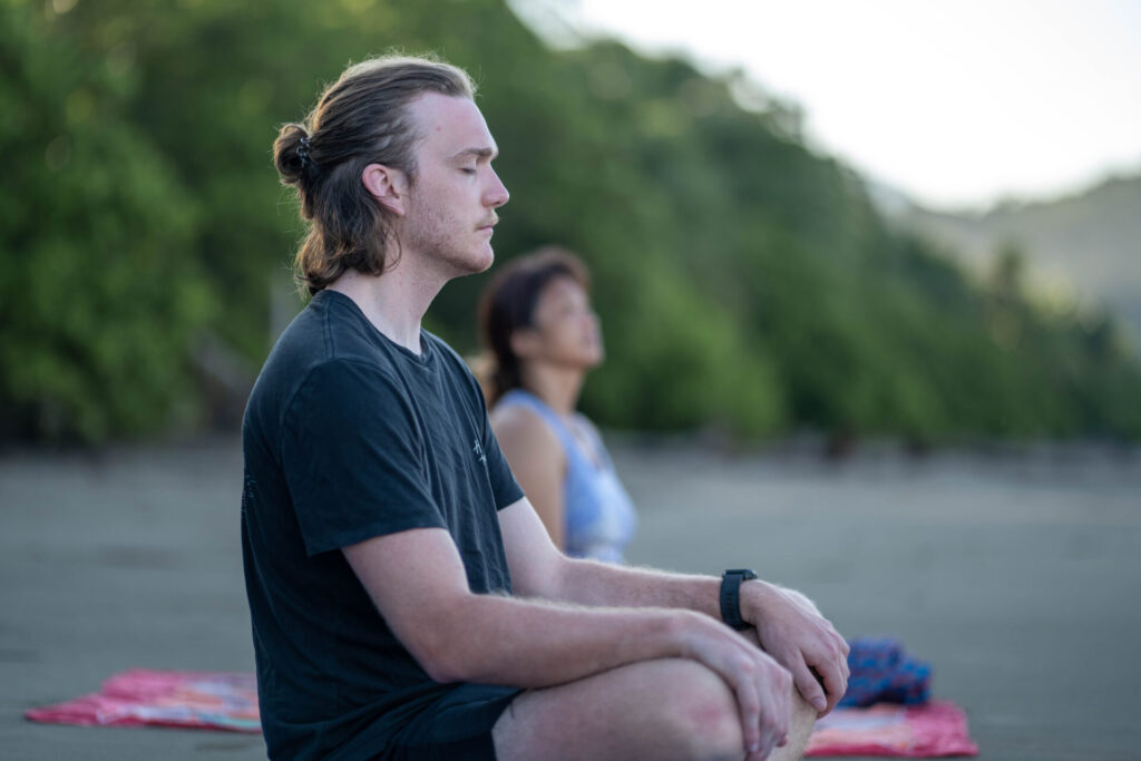 Beach yoga class in the Marino Ballena National Park with Bodhi Surf + Yoga in Uvita, Osa, Costa Rica